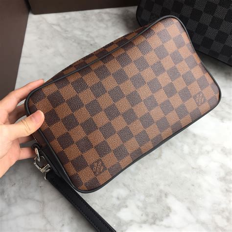 lv clutch men|louis vuitton men's clutch.